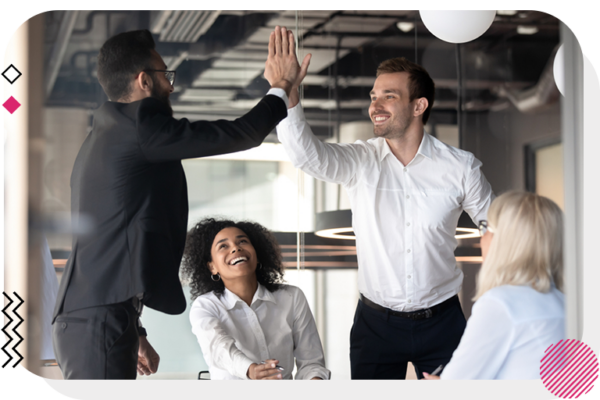 Business team high-fiving.