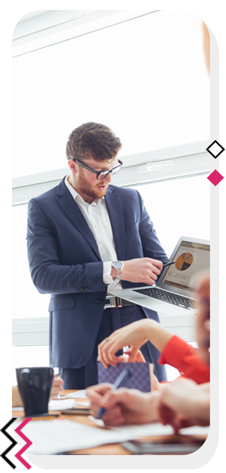 Man delivering a marketing presentation from his laptop.