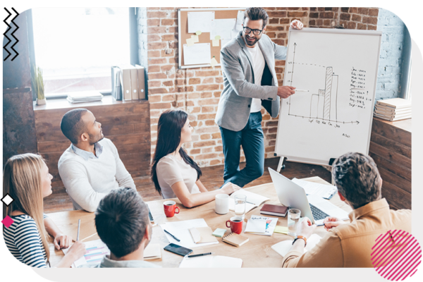 Business man giving a presentation to his team.