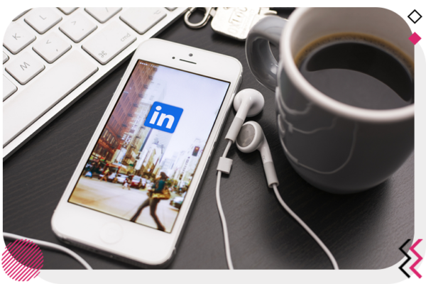 Mobile and coffee cup on a work desk