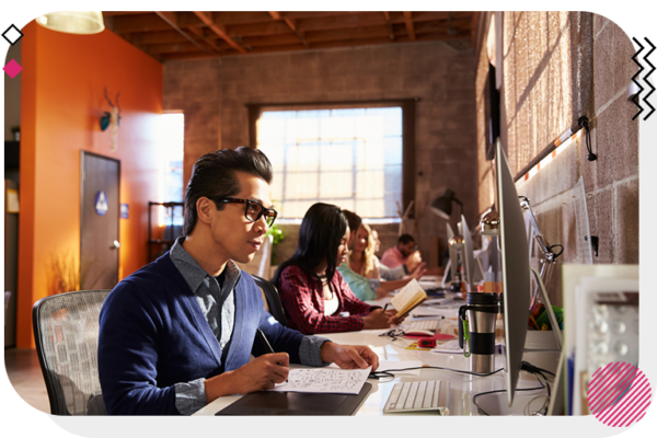 Designer working on computer in office