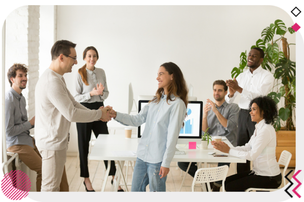 Handshake in team meeting