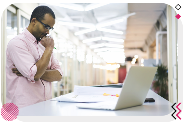 Man reviewing content on laptop