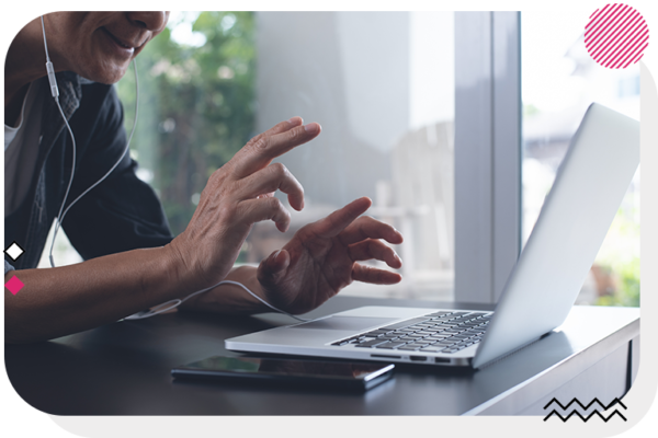 Man looking at laptop and moving his hands