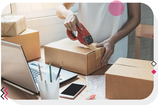 Person packaging and taping a box